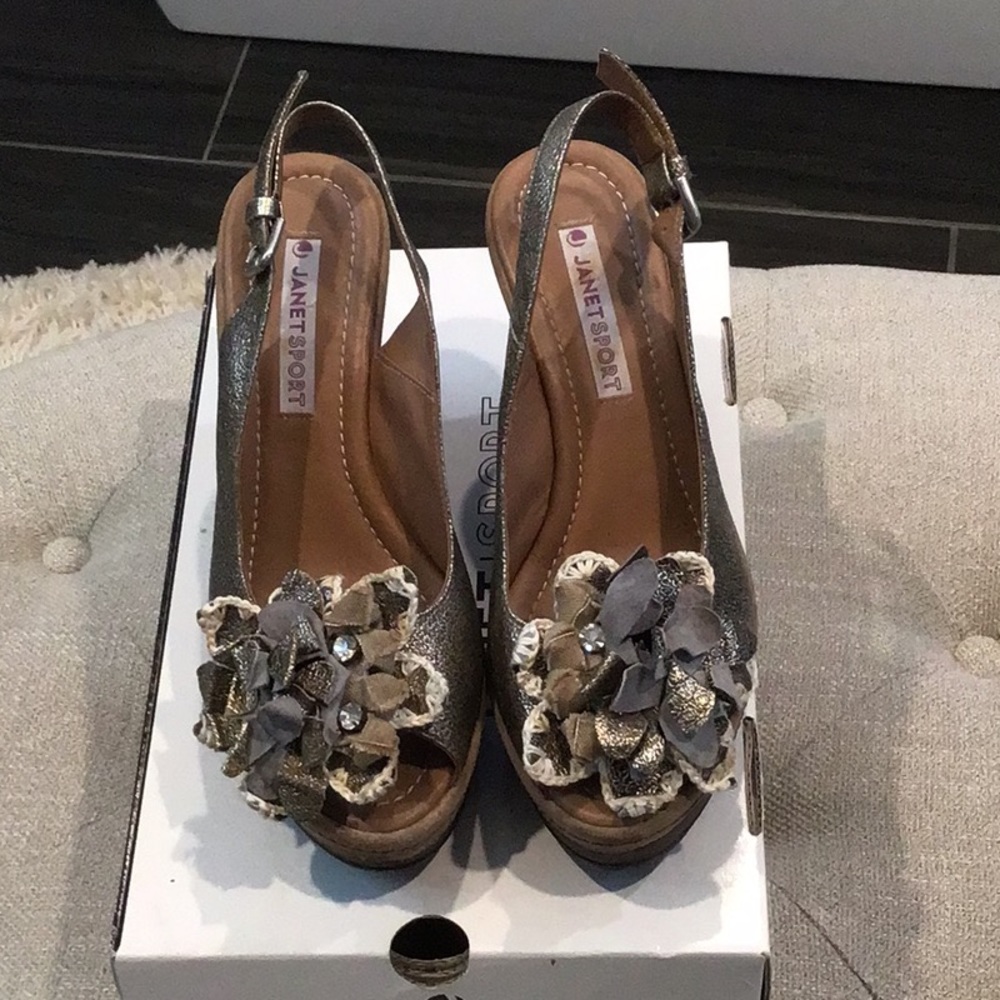 JanetSport wedge heeled shoes. Metallic leather with florets accent on toes